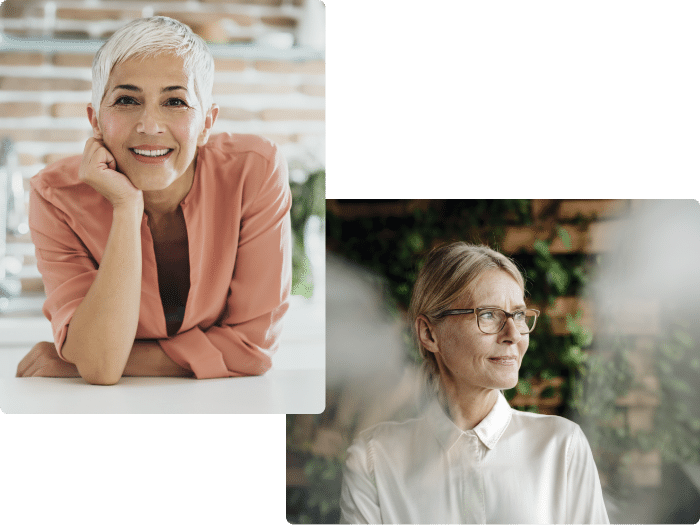 A woman over 50 with her chin resting on her hand looking into the camera and a woman over 50 wearing a buttoned up white shirt in a garden looking to her right